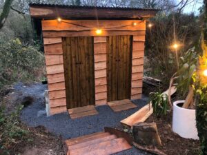 Exterior of off-grid composting toilet at Finnebrogue wood