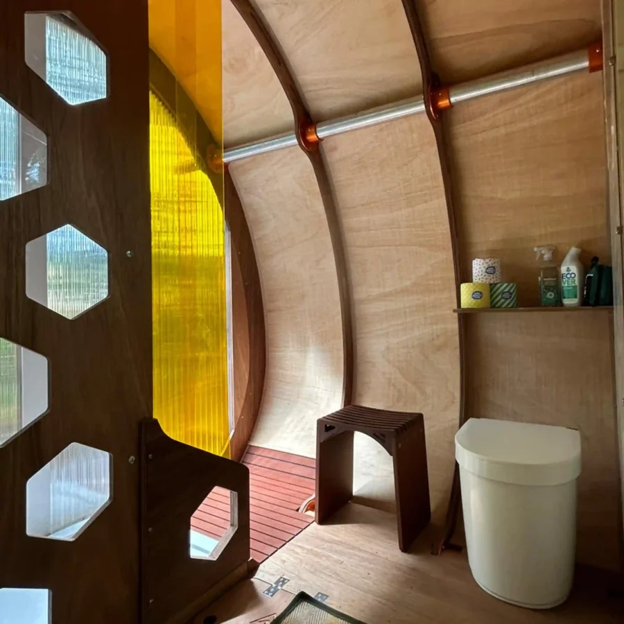 Separett Tiny toilet inside the shower unit at Strawberry Lane Tree Tents site.