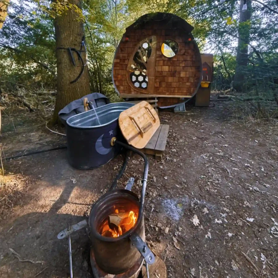 Outdoor hottub and shower/toilet unit at Strawberry Lane Tree Tents