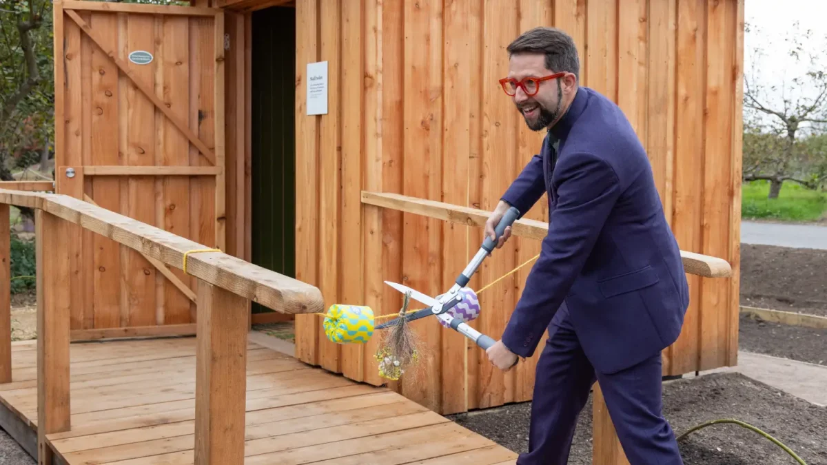 Ribbon cutting at RHS Wisley to celebrate the opening of the composting toilet