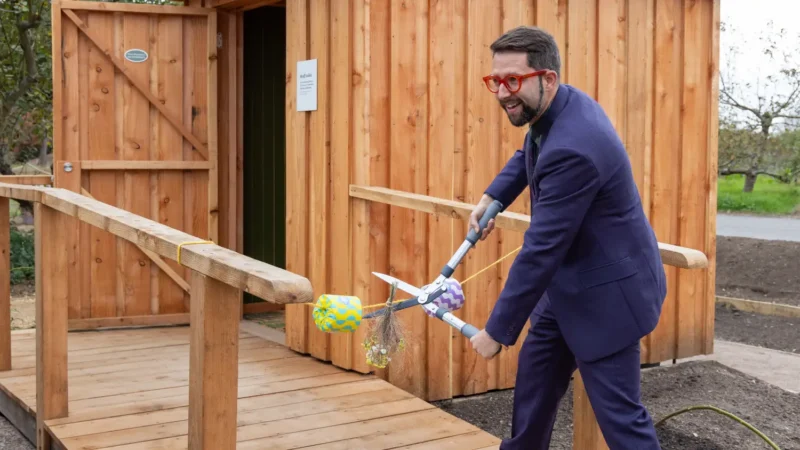 Ribbon cutting at RHS Wisley to celebrate the opening of the composting toilet